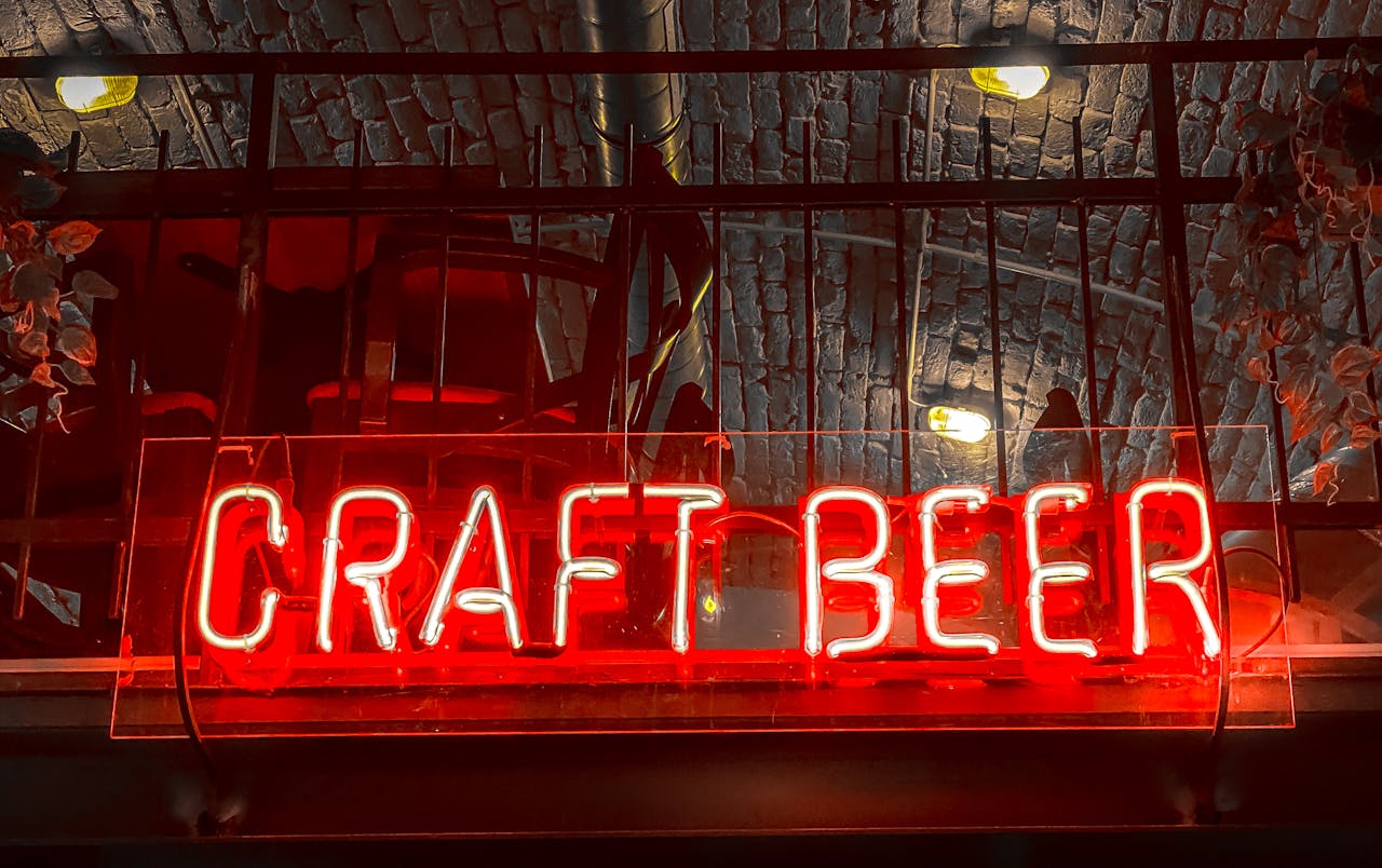 home-hero-bg Vibrant red neon sign for craft beer at a bar in Budapest, Hungary.